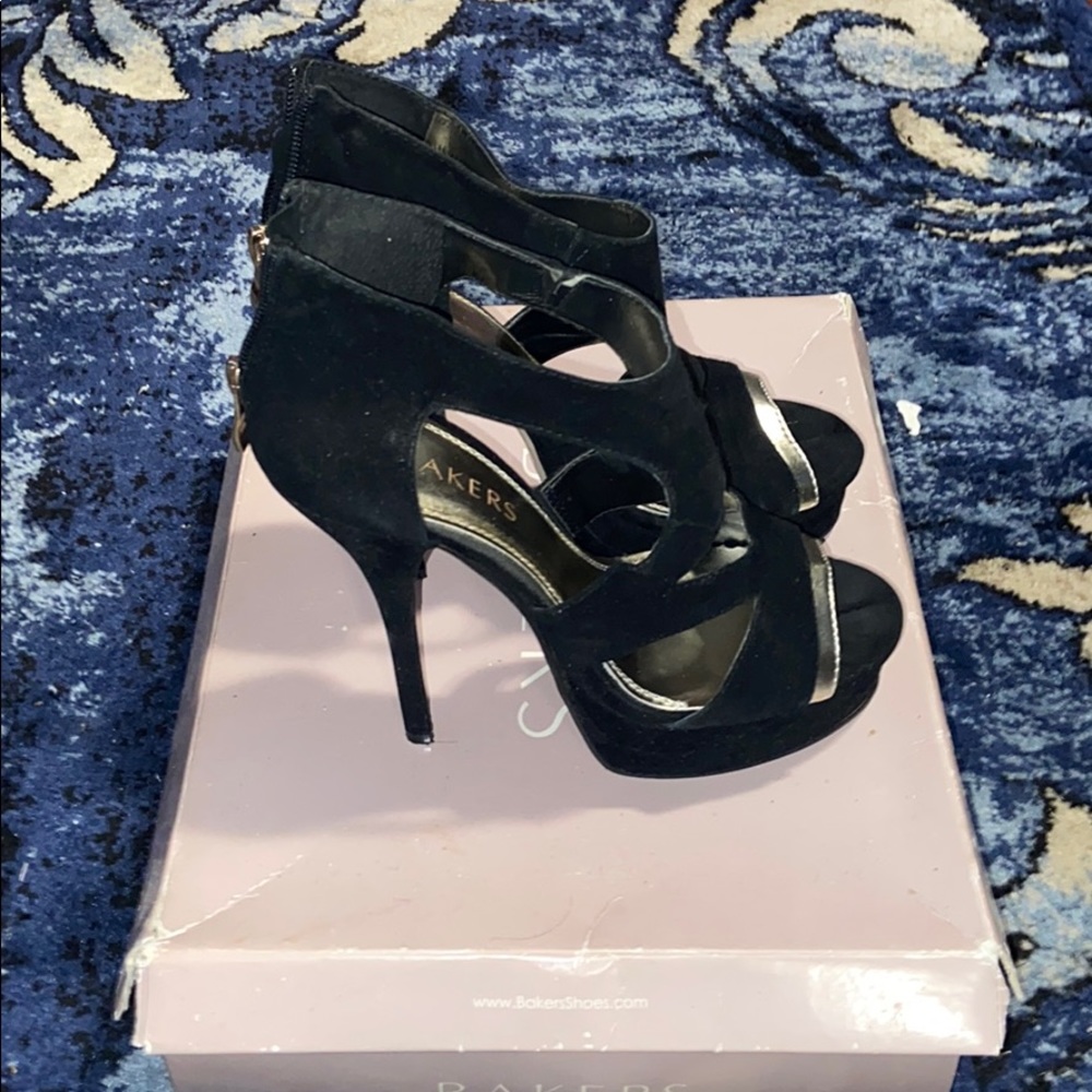 Black heels with gold accent by Bakers